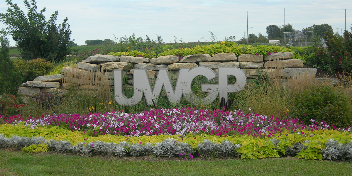 UWGP-Entrace-sign-with-flowers